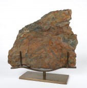 A Large fossil slab on stand,