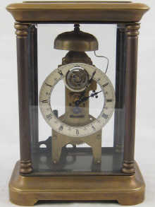A large four glass brass mantel