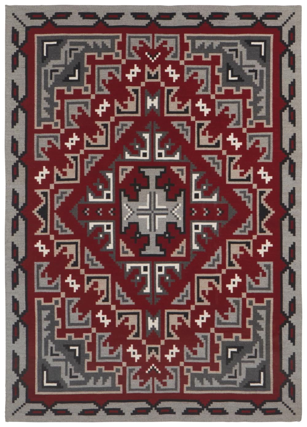 A LARGE FRAMED NAVAJO GANADO RUGA