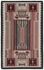 A LARGE FRAMED NAVAJO TEEC NOS