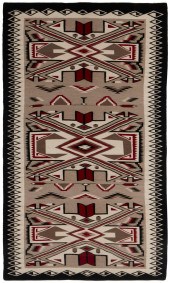 A LARGE FRAMED NAVAJO TEEC NOS