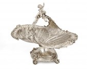 A LARGE GERMAN SILVER FOOTED C