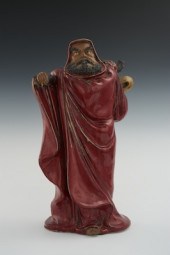 A Large Glazed Earthenware Fig