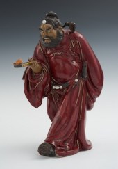 A Large Glazed Earthenware Fig