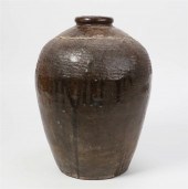 A LARGE GLAZED POTTERY JARA la