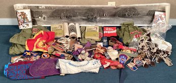 A large group of badges,