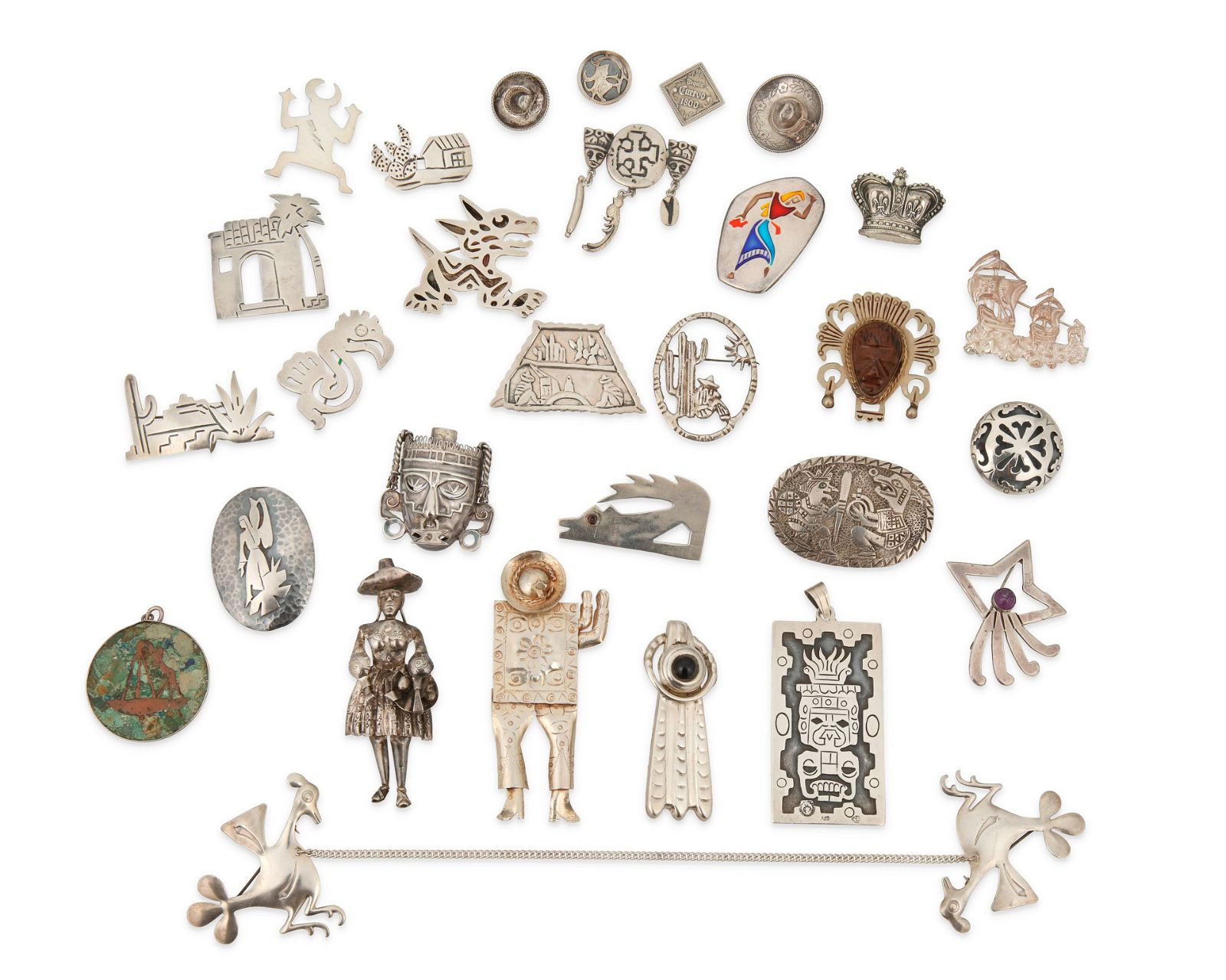 A LARGE GROUP OF SILVER BROOCHESA