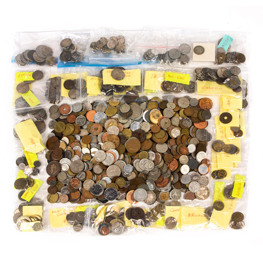 A LARGE GROUPING OF WORLD COINS A