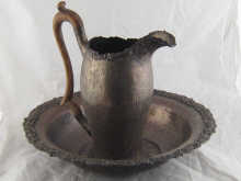 A large hand raised silver plated