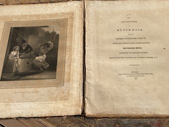 A large illustrated book dated