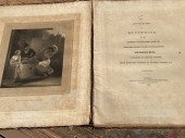 A large illustrated book dated