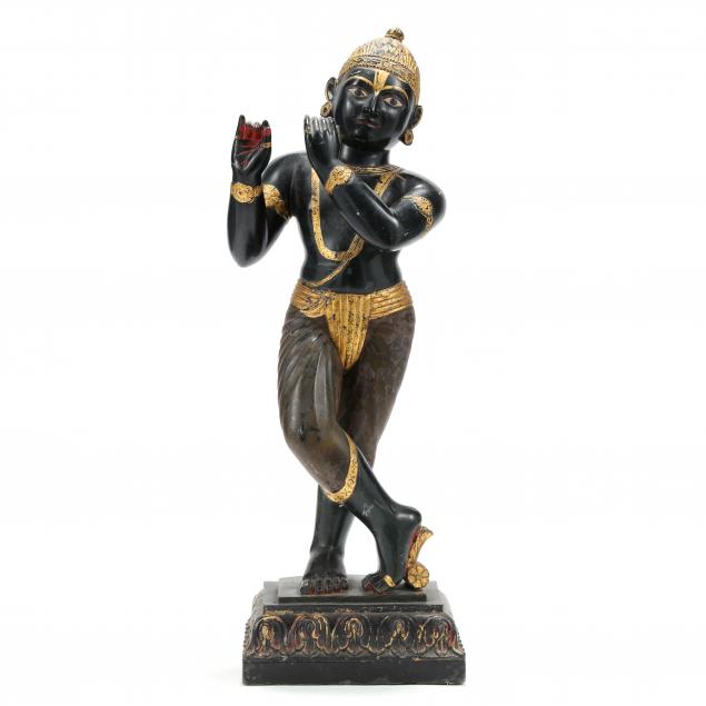 A LARGE INDIAN CARVED BLACK STONE