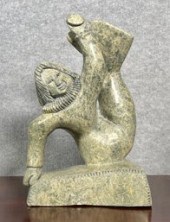 A large Inuit green soapstone