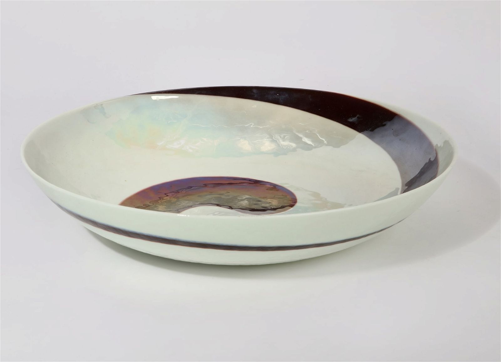 A LARGE IRIDESCENT WHITE AND