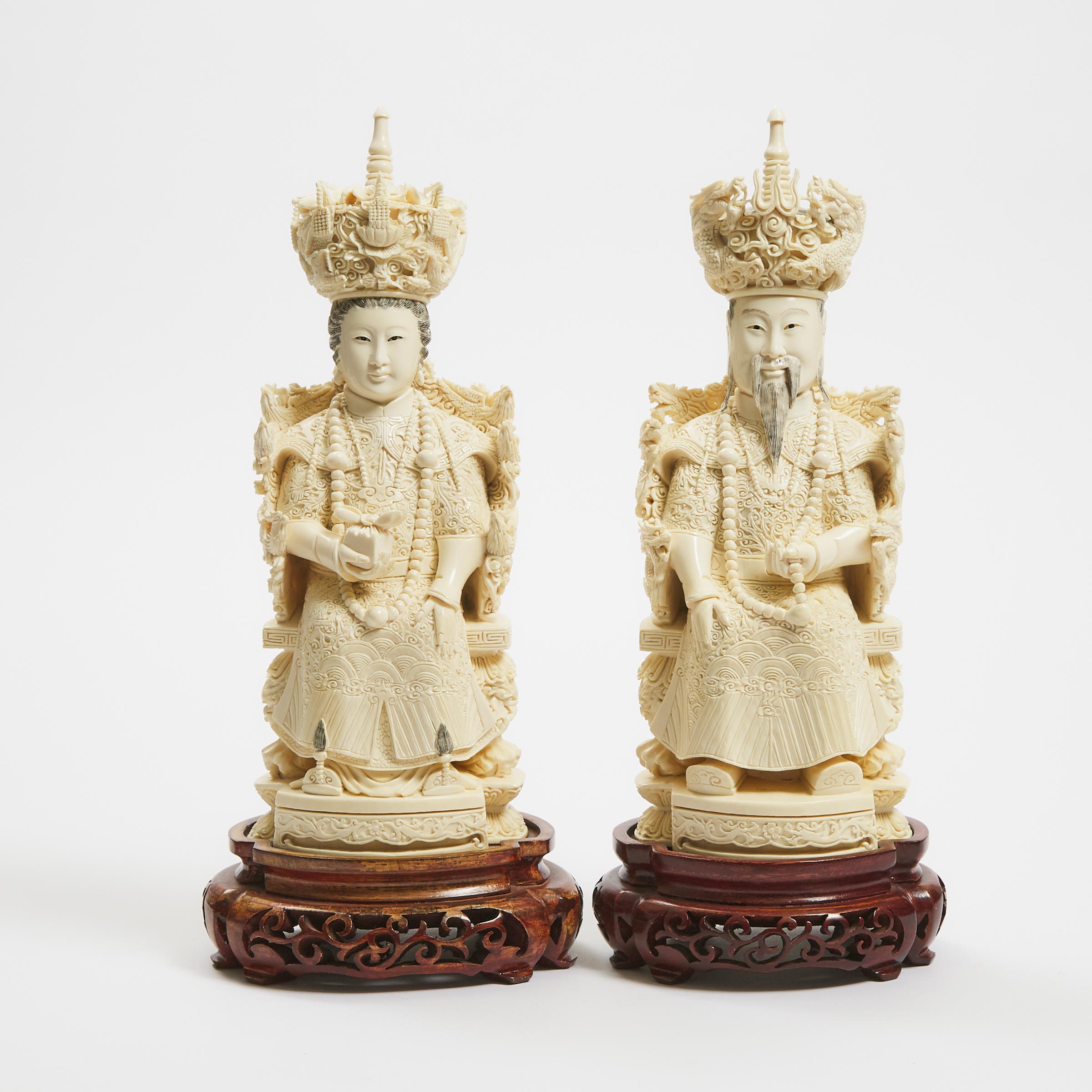 A Large Ivory Carved Emperor and