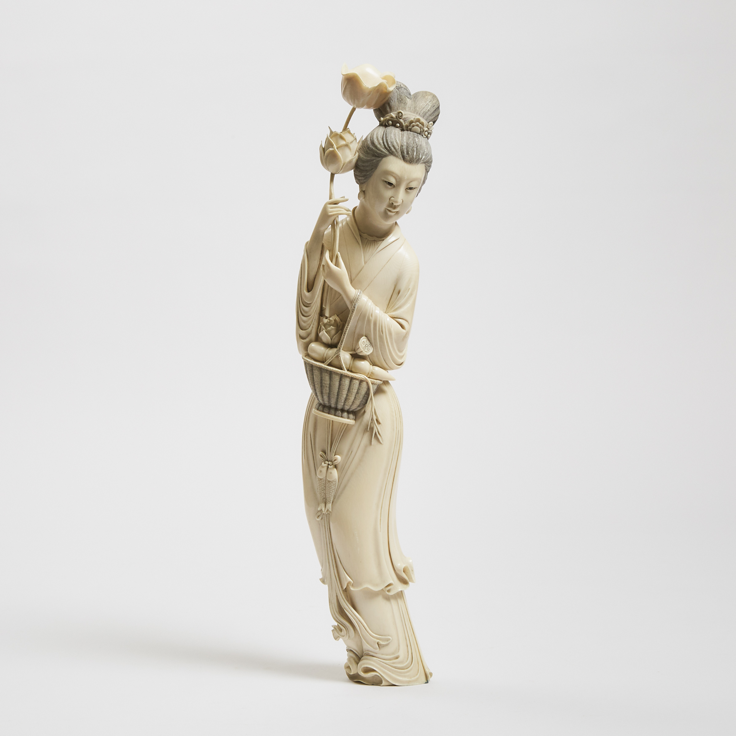 A Large Ivory Carving of a Female