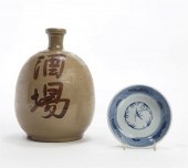 A LARGE JAPANESE GLAZED POTTER