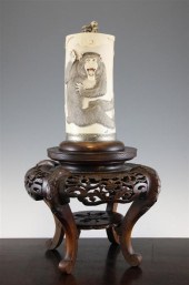 A large Japanese ivory 'monkey