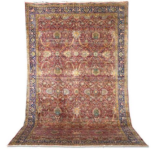 A LARGE KERMAN CARPET SOUTH CENTRAL