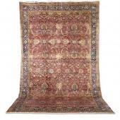 A LARGE KERMAN CARPET SOUTH CE