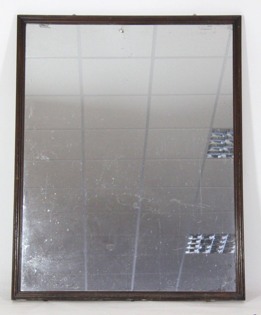 A large mahogany framed wall mirror