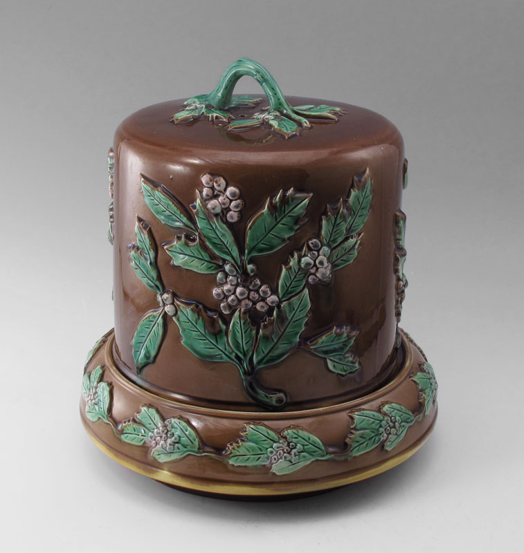 A LARGE MAJOLICA CHEESE BELL:
