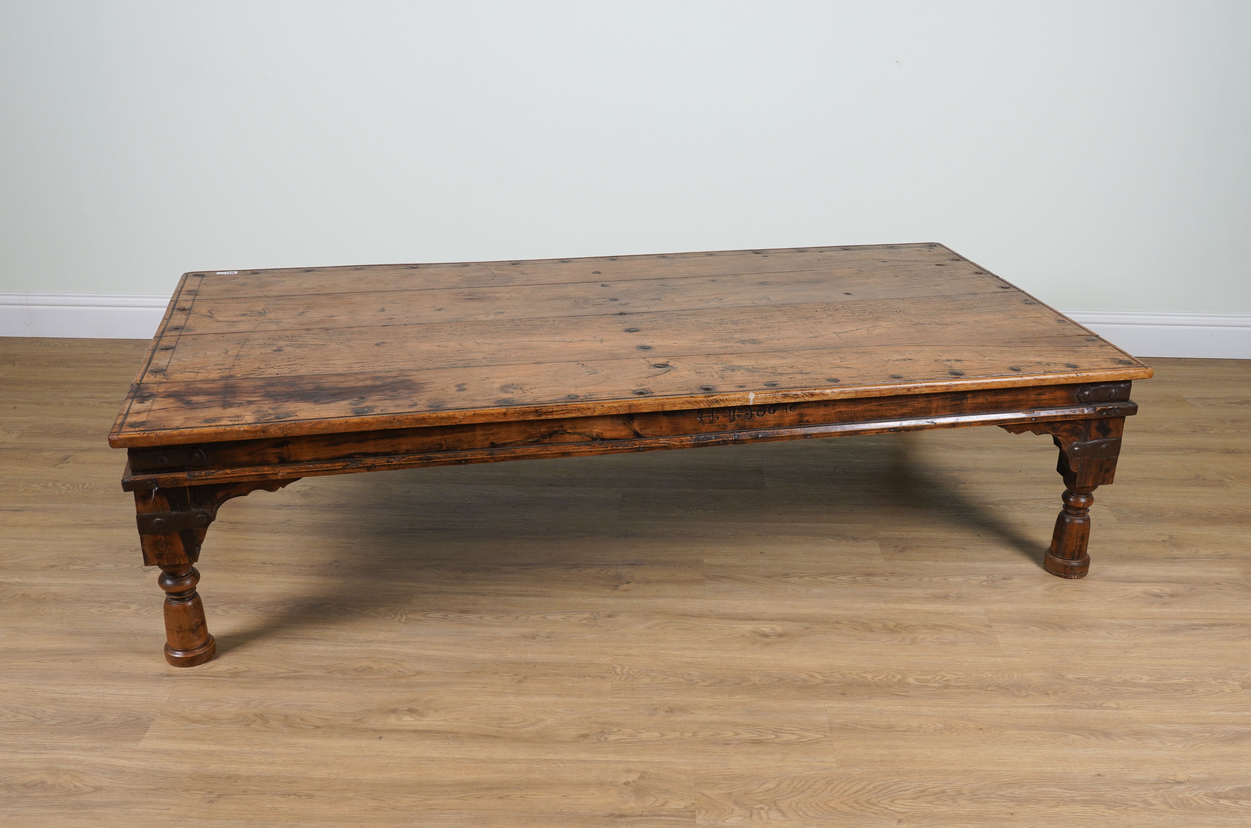 A LARGE METALBOUND INDIAN TEAK