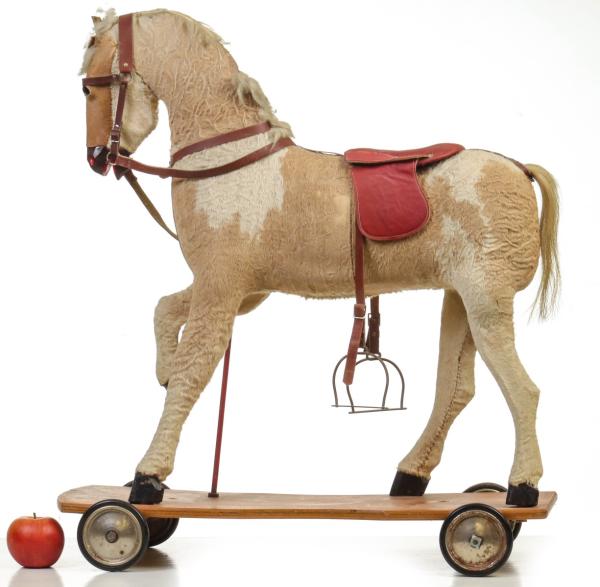 A LARGE MID-20TH CENTURY RIDE-ON