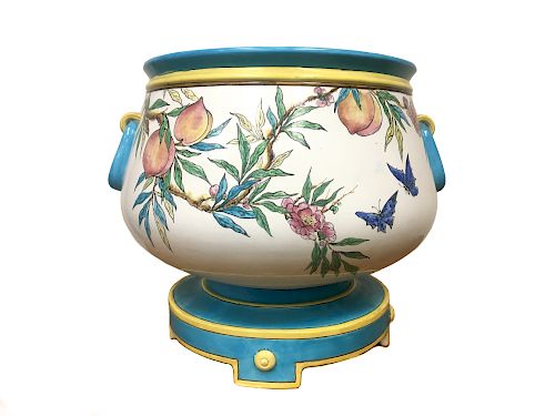A LARGE MINTON PLANTER ON STANDA