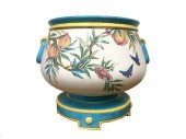 A LARGE MINTON PLANTER ON STAN