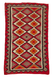 A LARGE NAVAJO REGIONAL RUG<br