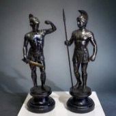 A LARGE PAIR OF CAST METAL ROM