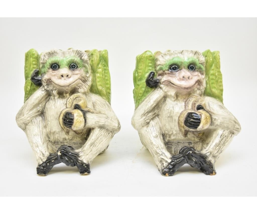 A large pair of ceramic monkey