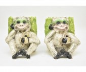 A large pair of ceramic monkey