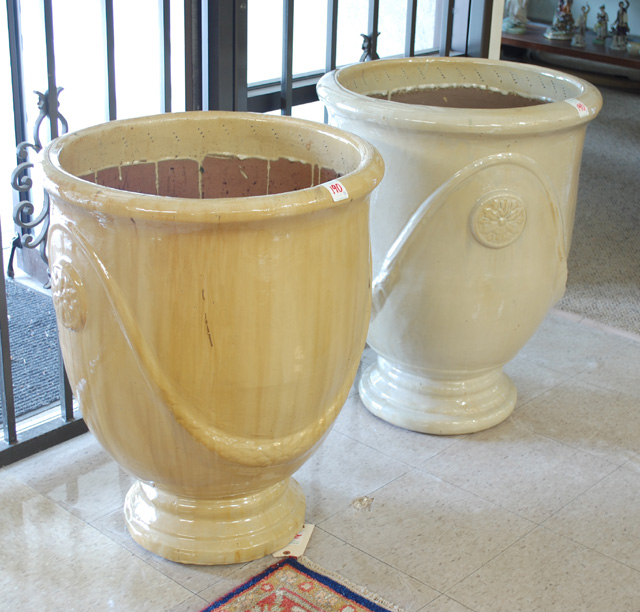 A LARGE PAIR OF POTTERY PLANTERS
