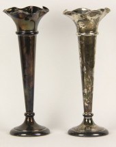 A large pair of silver spill v