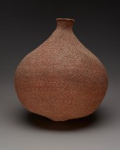 A LARGE PAIUTE TWINED SEED JAR