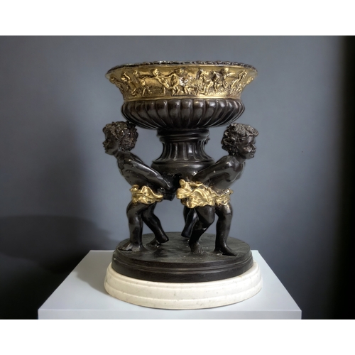 A LARGE PATINATED & GILT BRONZE