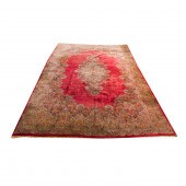 A LARGE PERSIAN KERMAN CARPET.