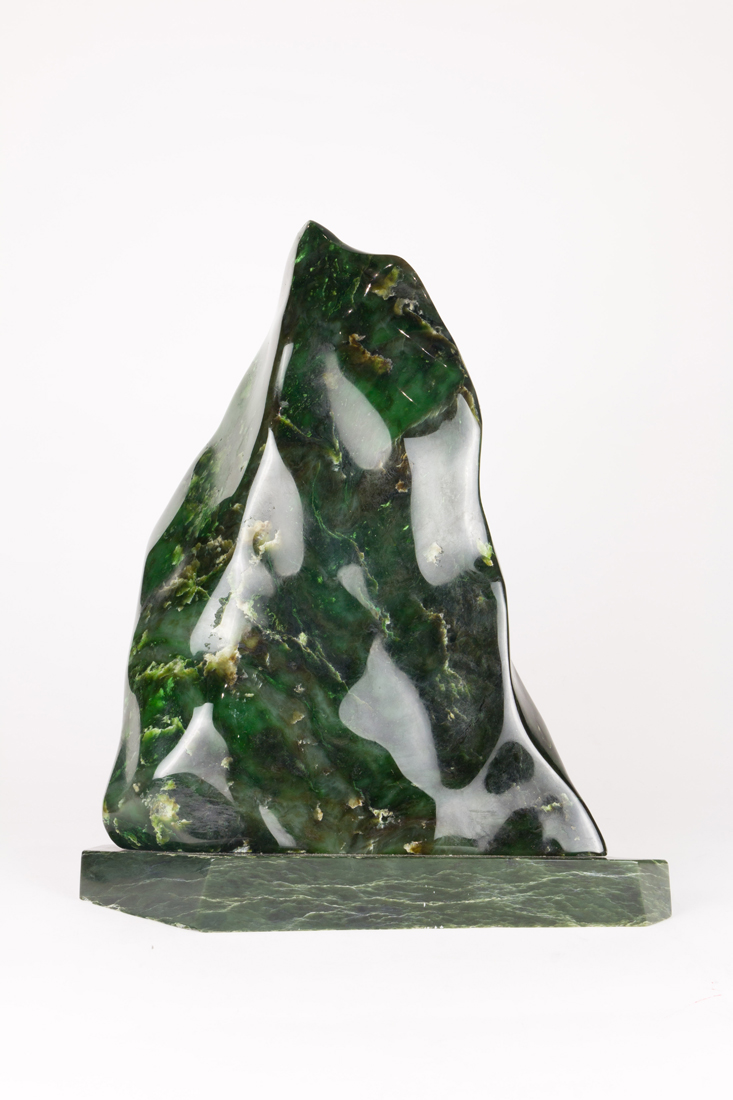 A LARGE POLISHED HARDSTONE SPECIMEN