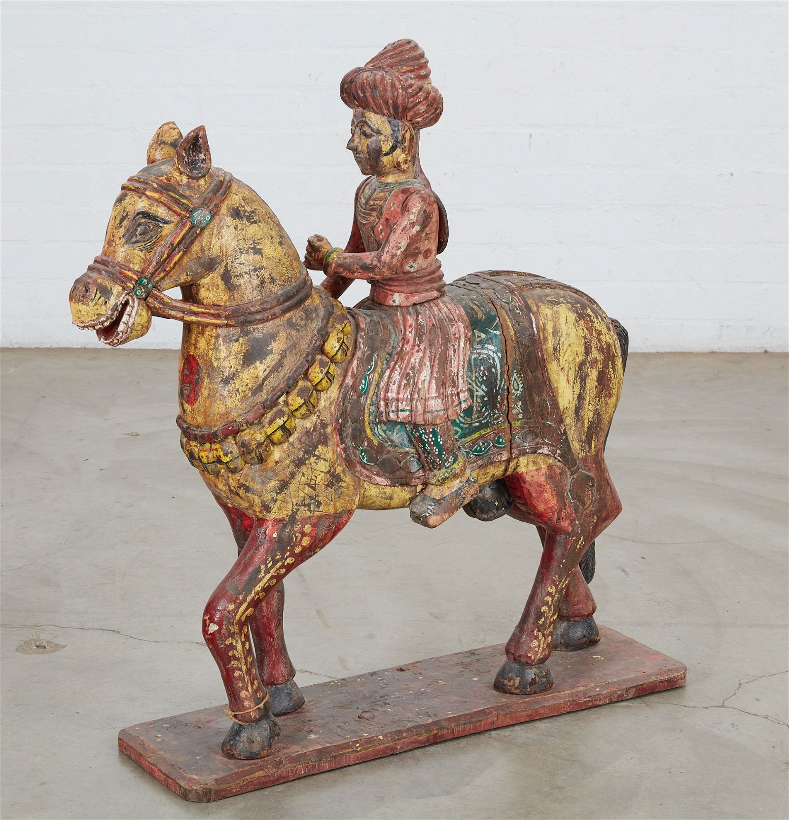 A LARGE POLYCHROME DECORATED