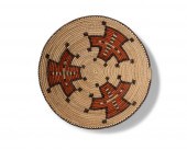 A LARGE POLYCHROME NAVAJO BASK