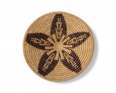 A LARGE POLYCHROME NAVAJO STAR