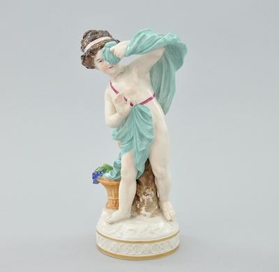 A Large Porcelain Figurine of a