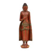 A LARGE RED LACQUERED SCULPTUR