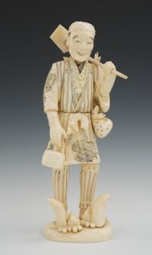 A Large Signed Carved Ivory Fi