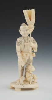 A Large Signed Carved Ivory Fi