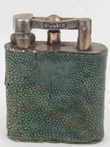 A large silver plated Dunhill table