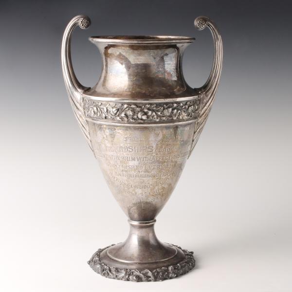 A LARGE SILVER PRESENTATION