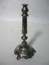 A large silverplate candlestic